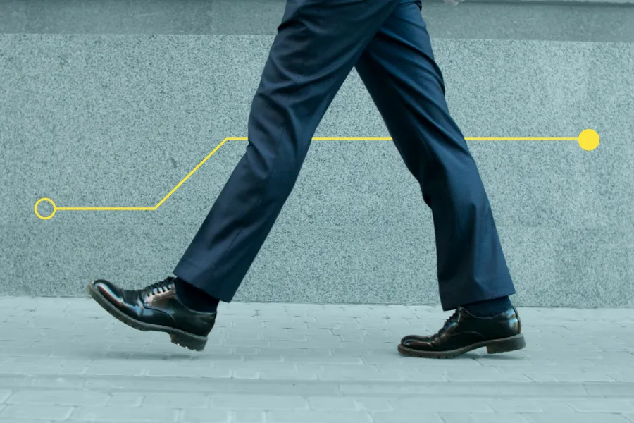 Man walking with dress shoes and slacks