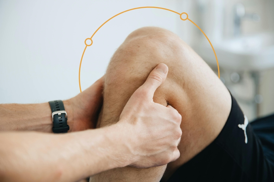 doctor holding examining knee
